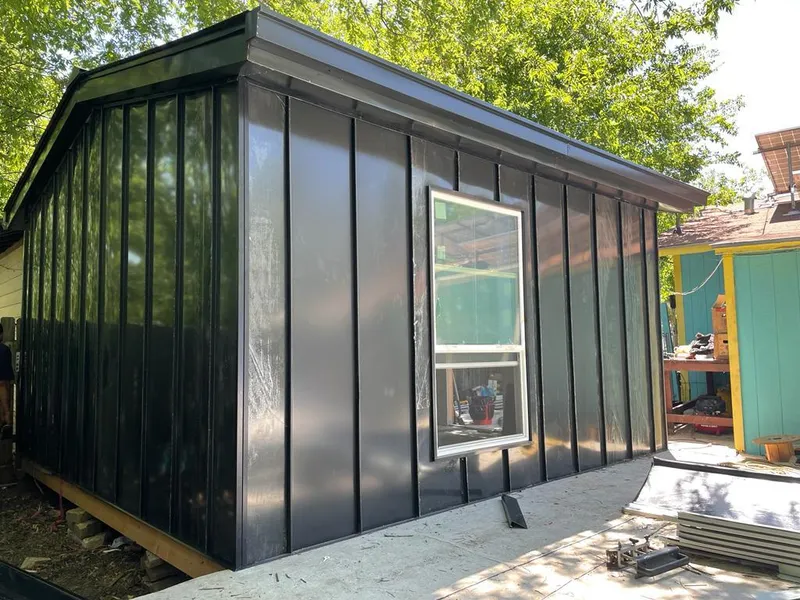 Black standing seam metal wall panels for Metal Roof Installation in Anchorage