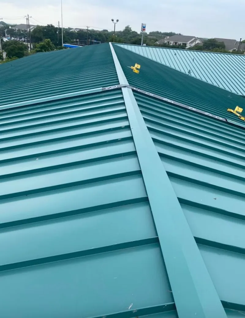 Green commercial metal roof ridge and valley for Metal Roof Repair in Anchorage