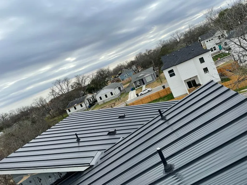 Standing seam metal roof panels with vents for Skylight Repair in Anchorage